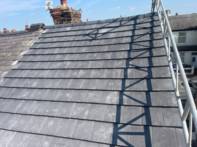 Grey Marley flat roof tiles installed by Blackpool Roofer